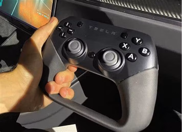 tesla dang thay doi cuoc choi lai xe bang dieu khien tu xa hinh 1