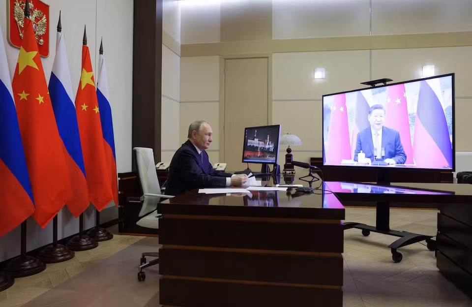 chu tich tap can binh va tong thong vladimir putin hoi dam truc tuyen hinh 1