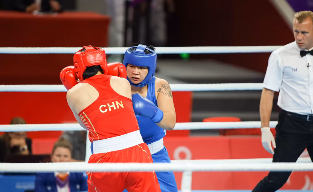 luu diem quynh gianh huy chuong dong boxing asiad 19 hinh 1