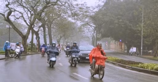 Hà Nội sáng có mưa nhỏ rải rác, trời rét (Ảnh: suckhoemoitruong)