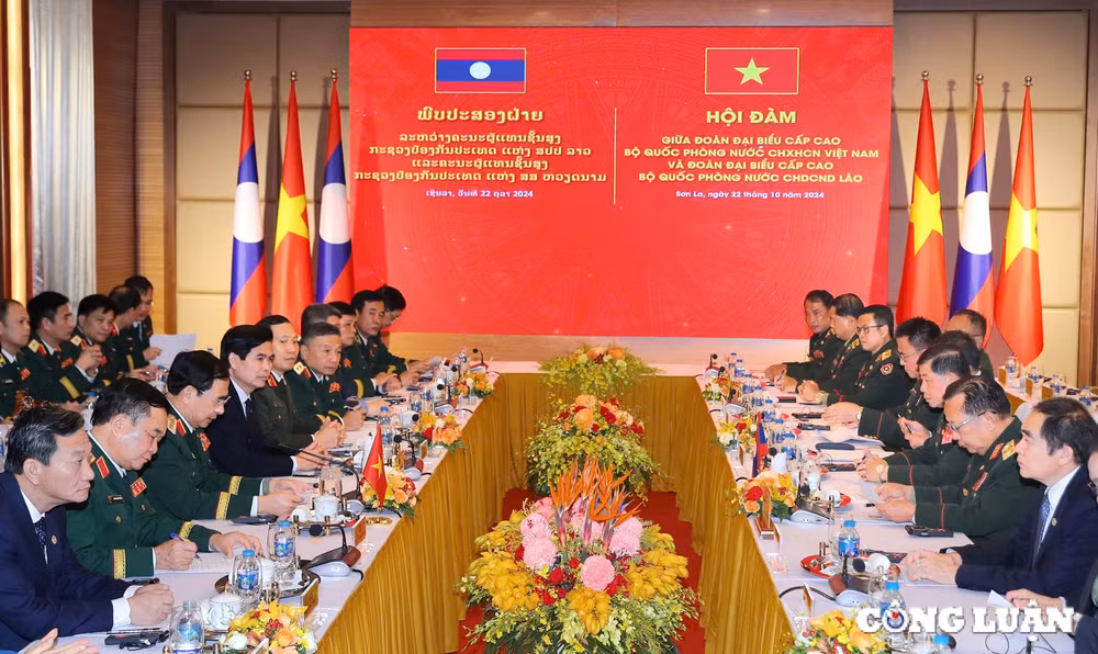viet nam lao cung nhau xay dung duong bien gioi hoa binh huu nghi hop tac va phat trien hinh 1