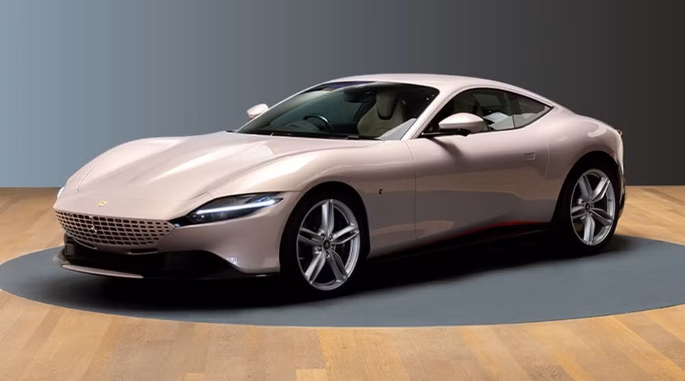 sieu xe ferrari roma mau hong rose cuon hut hinh 1