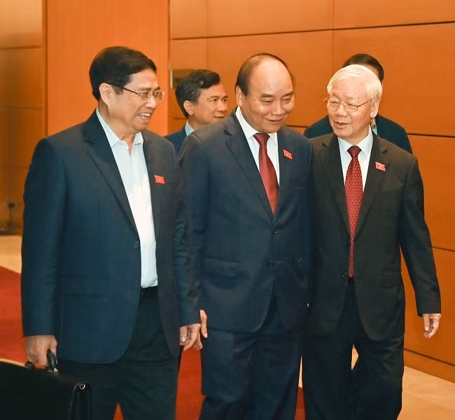 Tổng Bí thư Nguyễn Phú Trọng, Chủ tịch nước Nguyễn Xuân Phúc, Thủ tướng Phạm Minh Chính tại kỳ họp thứ 11 Quốc hội khóa XIV.