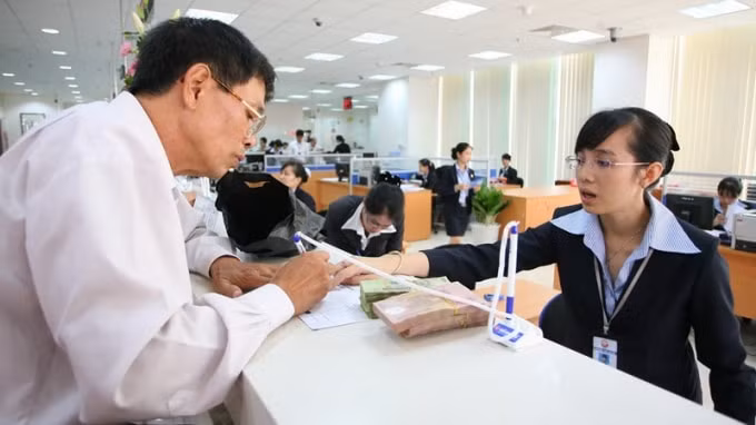 NHNN đã cắt giảm 100 thủ tục hành chính, đơn giản hoá 80/257 điều kiện kinh doanh trong lĩnh vực ngân hàng. (Ảnh TL)