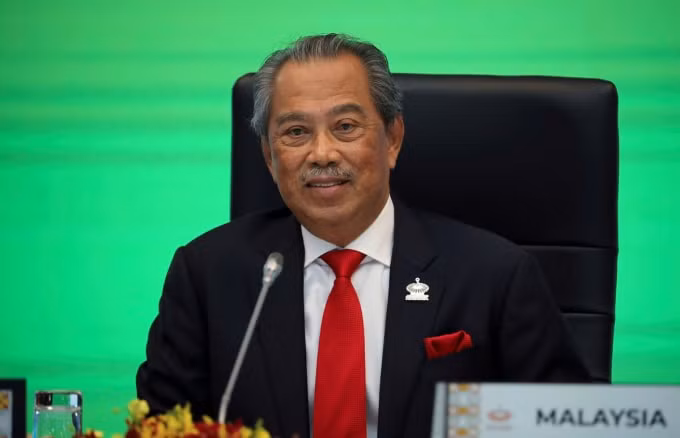 Thủ tướng Malaysia Muhyiddin Yassin phát biểu khai mạc Hội nghị các nhà lãnh đạo kinh tế APEC 2020, tại Kuala Lumpur, Malaysia ngày 20 tháng 11 năm 2020. @ REUTERS / Lim Huey Teng