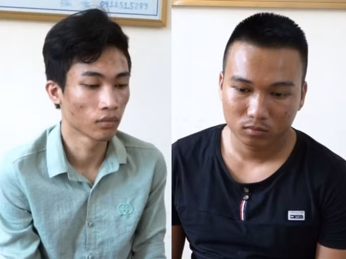 Hai đối tượng Nguyễn Lâm Thế Vinh và Lê Anh Huy tại cơ quan điều tra. Ảnh: Công an tỉnh Quảng Bình.