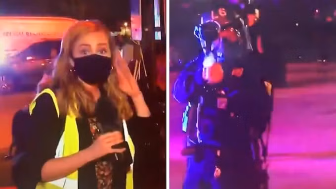 Phóng viên Kaitlin Rust của WAVE News trở thành mục tiêu của cảnh sát tại Louisville - Ảnh: Reuters