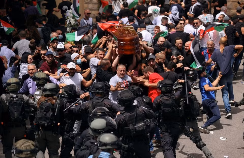 bao luc xay ra trong dam tang cua nu nha bao palestine hinh 1