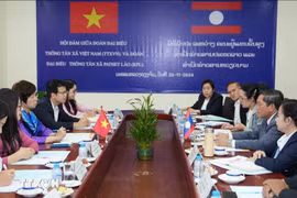 Hai hãng Thông tấn quốc gia Việt Nam - Lào tiếp tục tăng cường hợp tác