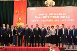 Báo Nhân Dân và Tân Hoa Xã thúc đẩy giao lưu, hợp tác