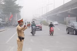 Hà Nội: Khuyến cáo lái xe di chuyển khi thời tiết xấu có mưa phùn, sương mù