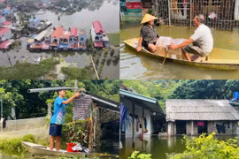 Hàng trăm hộ dân tại Mỹ Đức (Hà Nội) vẫn bị nhấn chìm trong biển nước lũ
