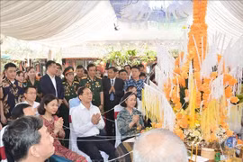 Lãnh đạo Đảng, Nhà nước tham dự đón Tết cổ truyền Bunpimay của Lào