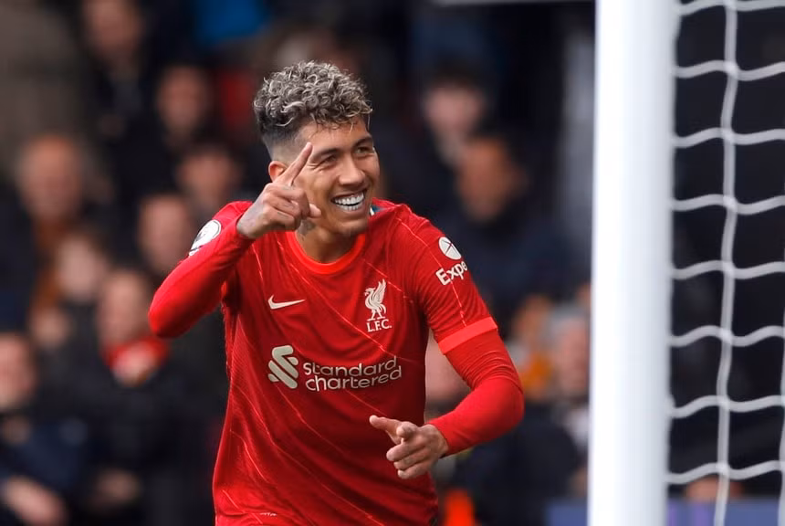 firmino lap hat trick liverpool thang 5 0 watford vuon len dan dau premier league hinh 1