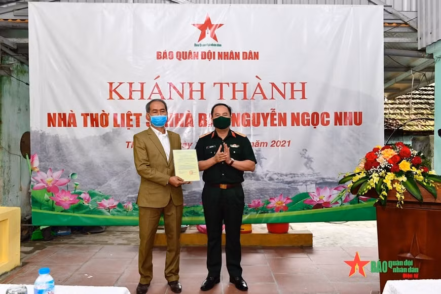 bao quan doi nhan dan khanh thanh va ban giao nha tho cho than nhan liet si nha bao hinh 1