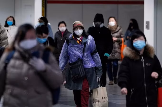 Người dân tại Bắc Kinh, Trung Quốc. Ảnh: Reuters