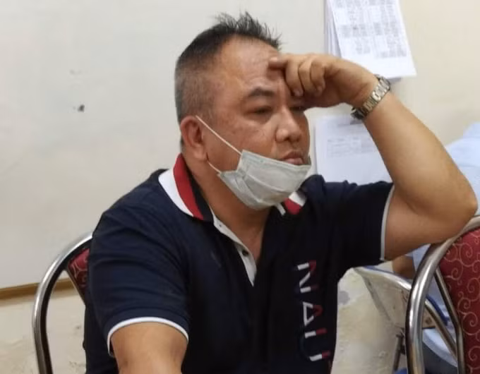 Đối tượng Bùi Hữu Lộc, 48 tuổi, quốc tịch Mỹ đang bị tạm giữ -ảnh: T/L