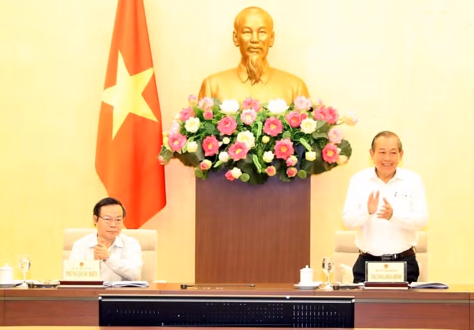 Phó Thủ tướng Thường trực Chính phủ Trương Hòa Bình và Phó Chủ tịch Quốc hội Phùng Quốc Hiển đồng chủ trì cuộc làm việc. Ảnh: VGP