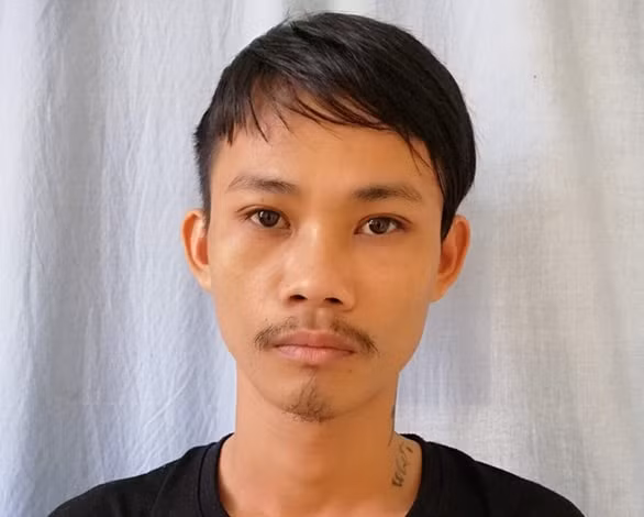 Nguyễn Hồng Hạnh tại cơ quan điều tra. Ảnh do công an cung cấp.