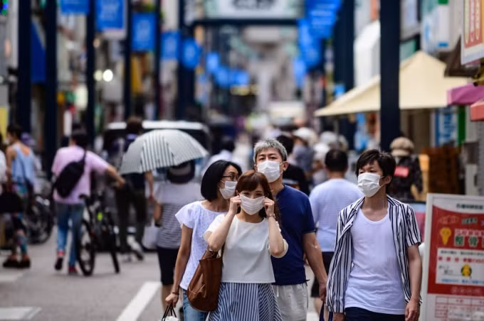 Người dân đeo khẩu trang phòng dịch COVID-19 tại Tokyo, Nhật Bản. Ảnh minh họa.