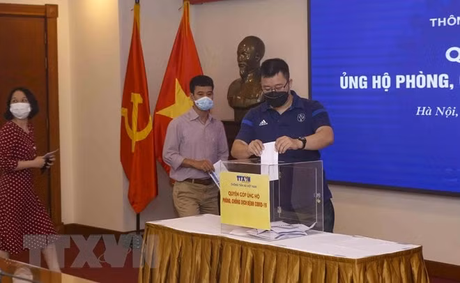 can bo nhan vien ttxvn chung tay ung ho cong tac phong chong dich covid 19 hinh 2