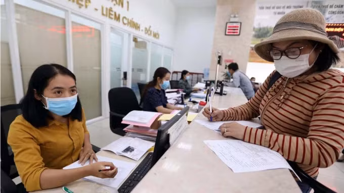 Nhiều doanh nghiệp, người dân đã được hưởng các chế độ chính sách miễn giảm của ngành Thuế. Ảnh TL