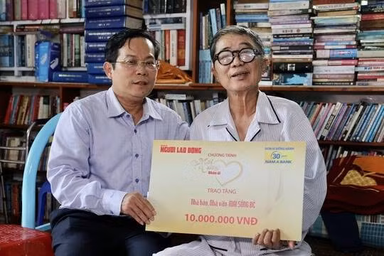 chuong trinh mai vang nhan ai cua bao nguoi lao dong chia se voi nha bao mai song be hinh 1