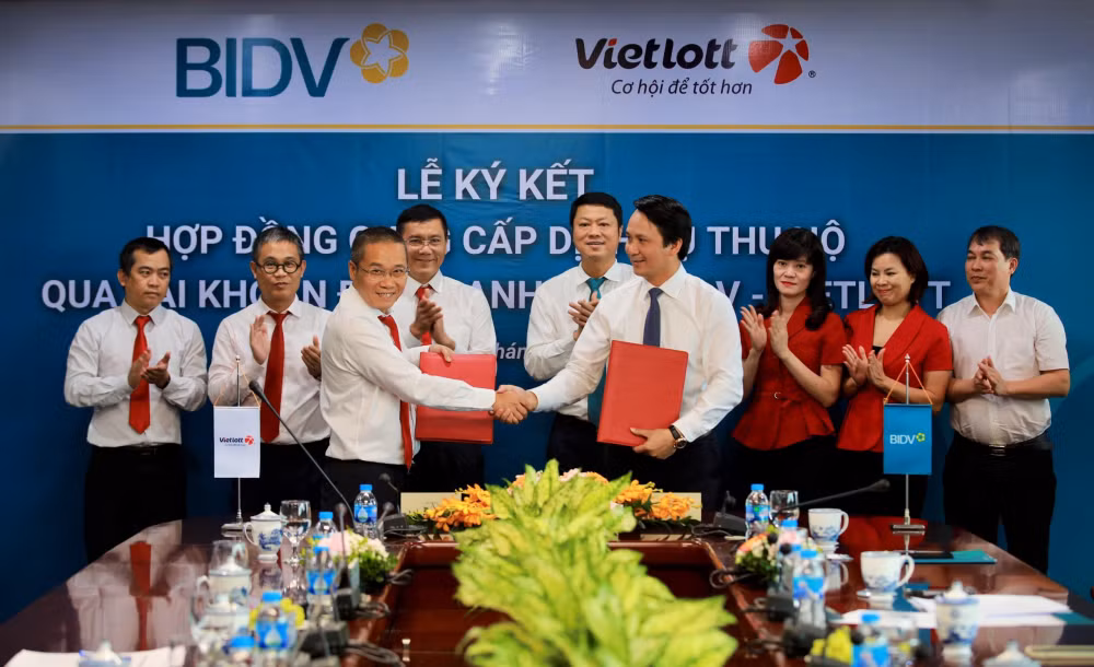 bidv va vietlott ky ket hop dong dich vu thu ho qua tai khoan dinh danh hinh 1
