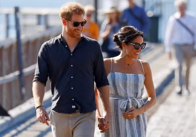 Hoàng tử Harry và vợ Meghan Markle. Ảnh: Reuters